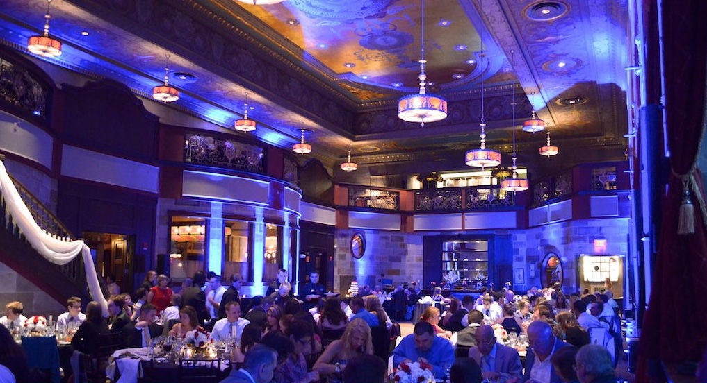 Blue uplighting transforming the ballroom at the Society Room of Hartford CT