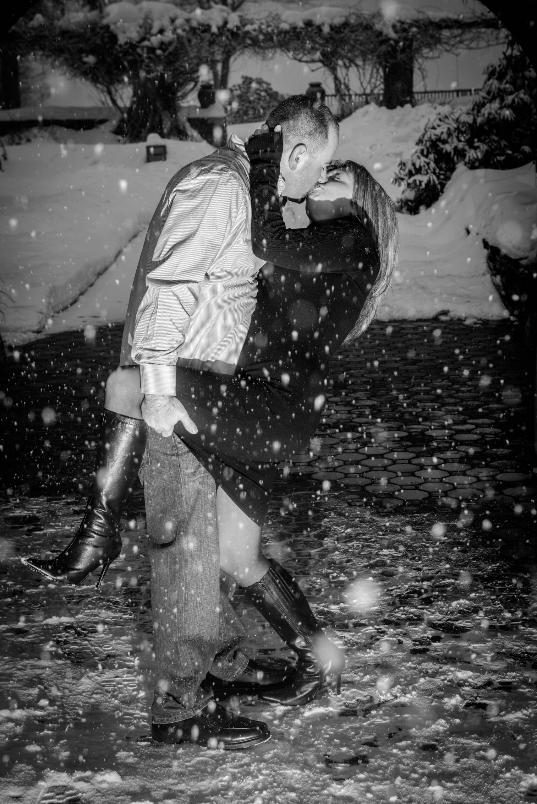 Engaged couple during a winter engagement session in the snow at St. Clements Castle in Portland CT