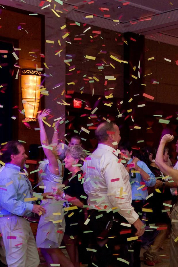 Colorful confetti raining down on wedding guests dancing at Mohegan Sun in CT